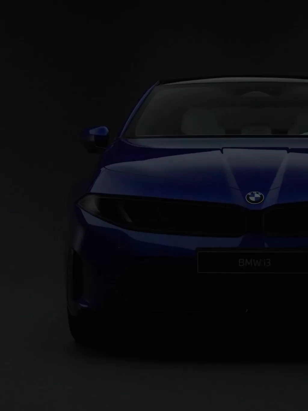 BMW i3 세단(NA0) 실내 파노라믹 디스플레이 및 스티어링 휠 조작부 사진